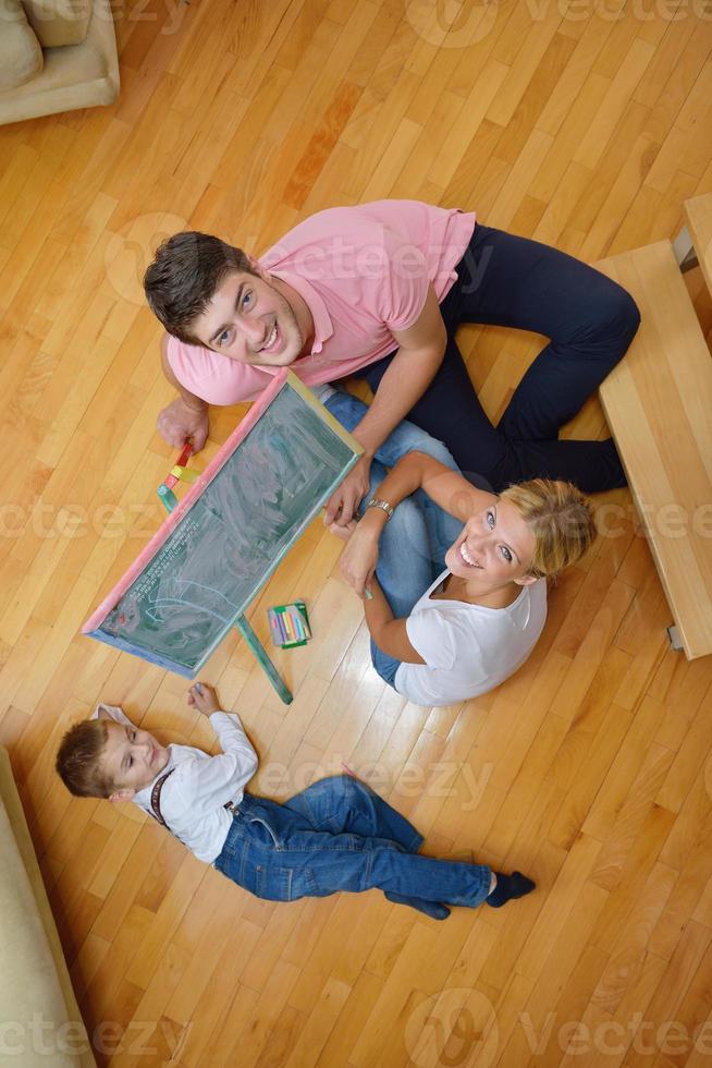 family drawing on school board at home photo