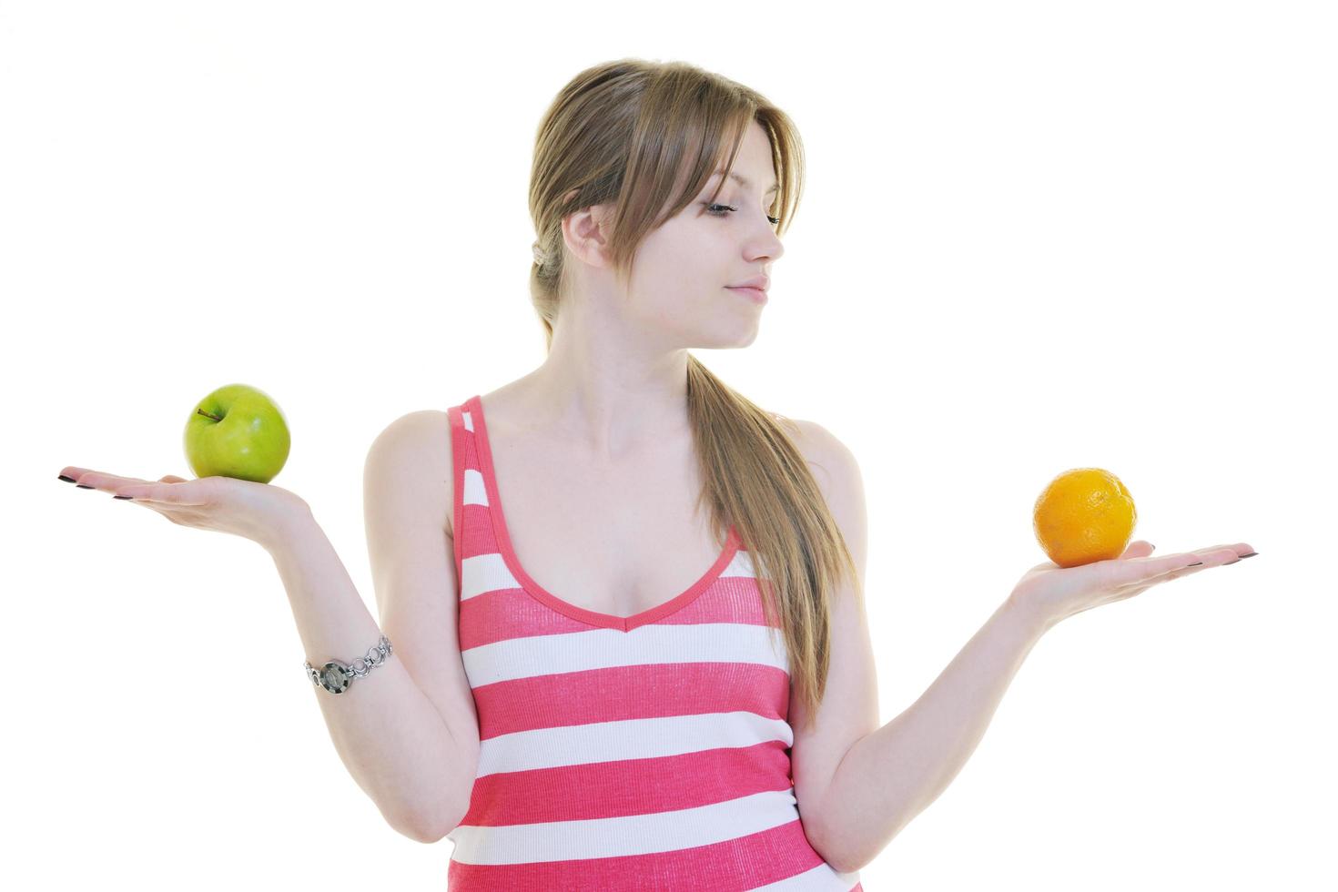 happy  young  woman eat apple isolated  on white photo