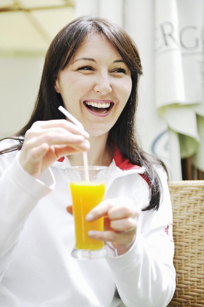 woman drink juice outdoor photo