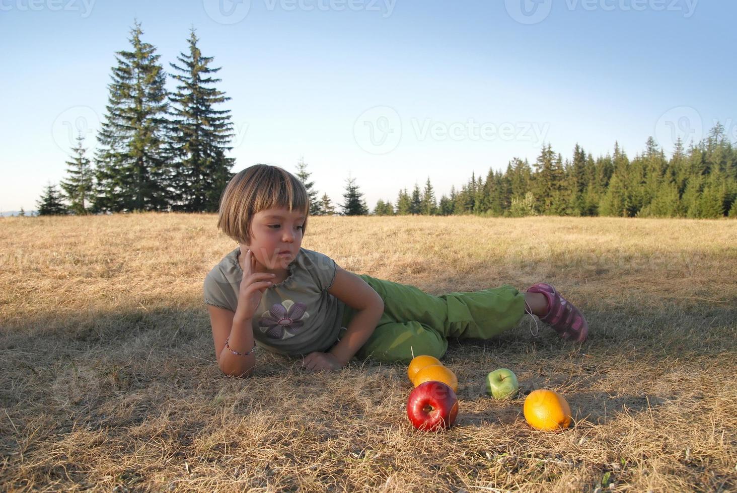 Child playing outside photo