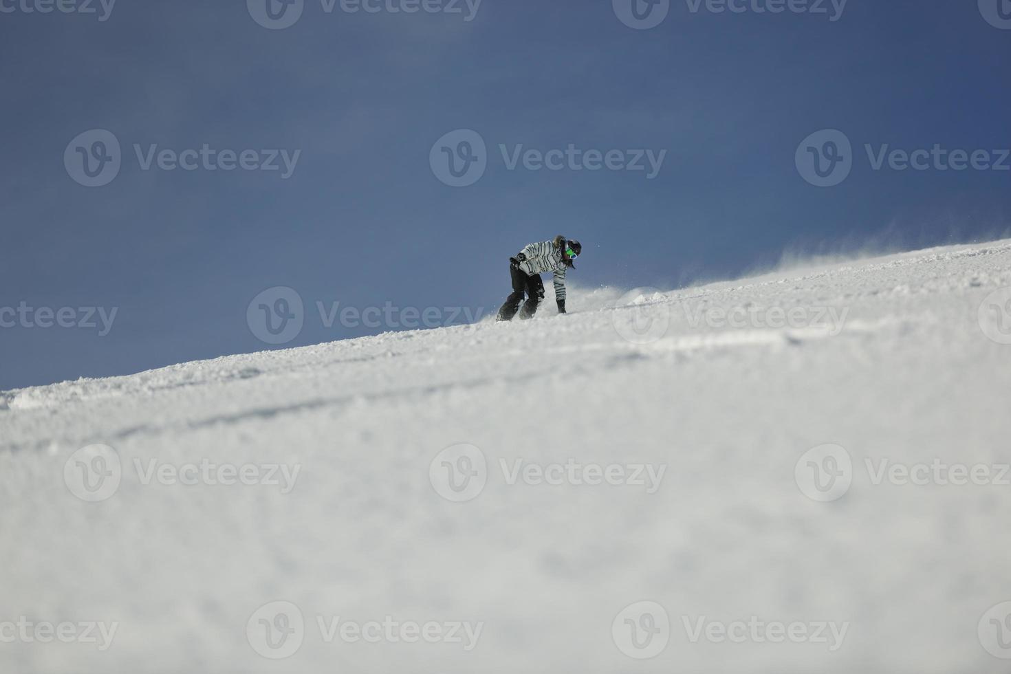 Skiers on mountain photo