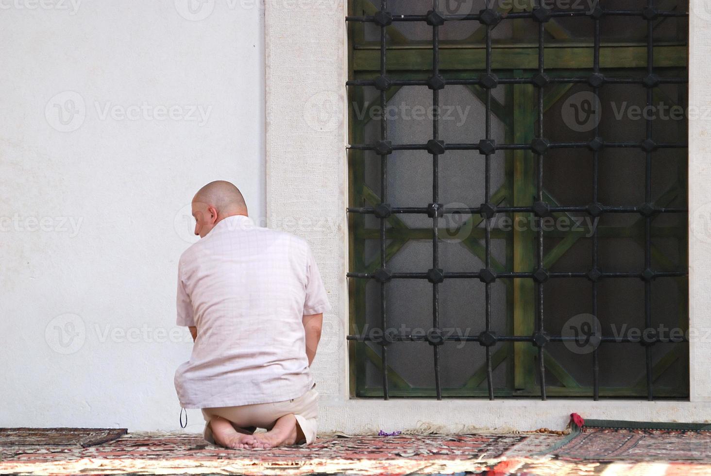 Man in prayer photo