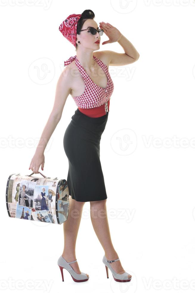 isolated woman with travel bag photo