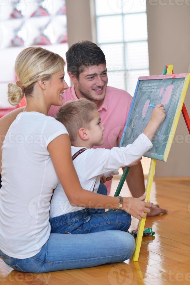 family drawing on school board at home photo