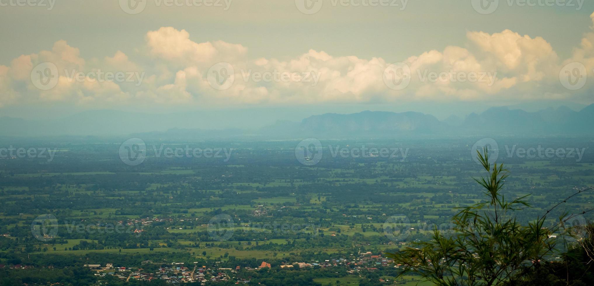 The beautiful natural landscape of a small urban community and fog in the rainy season of Thailand. photo