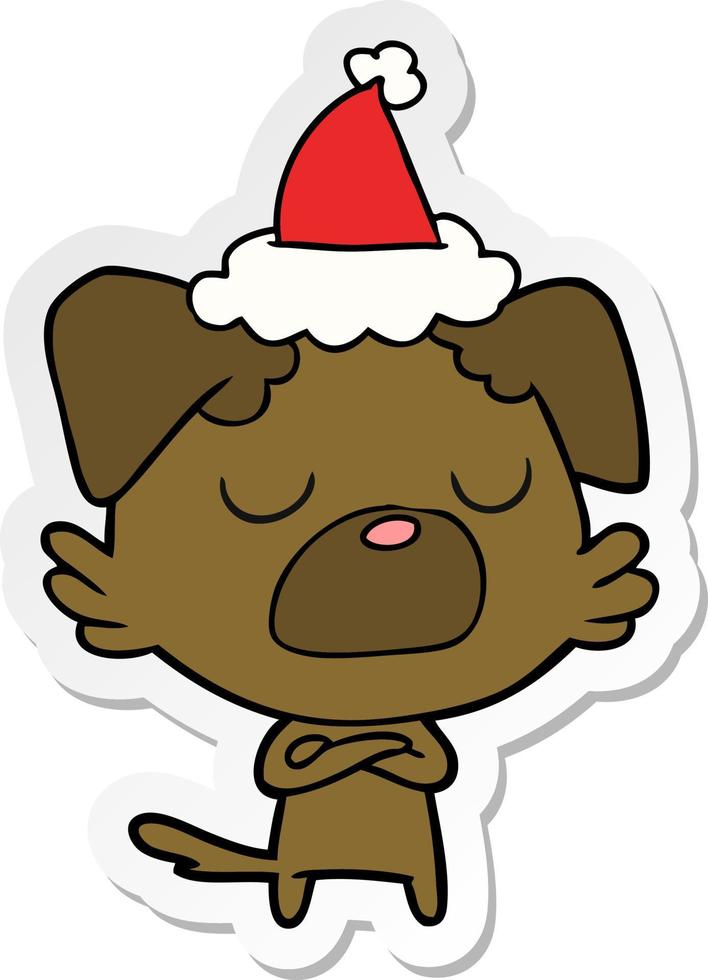 sticker cartoon of a dog wearing santa hat vector