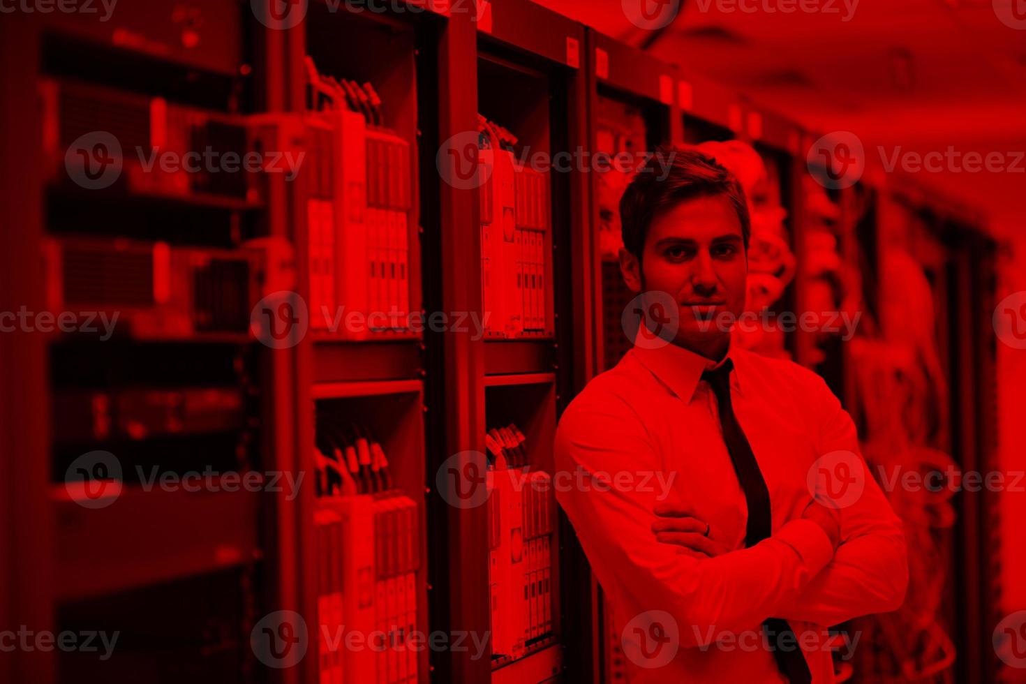 young it engeneer in datacenter server room photo