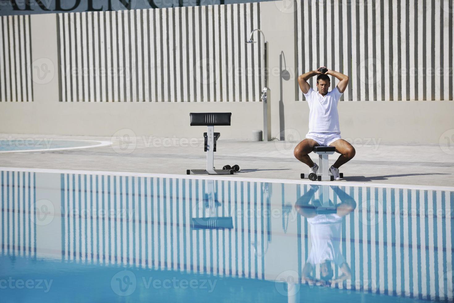 Exercising by pool 11593895 Stock Photo at Vecteezy