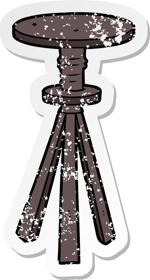 distressed sticker of a cartoon stool vector