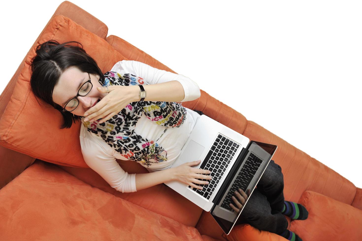 woman using a laptop computer at home photo