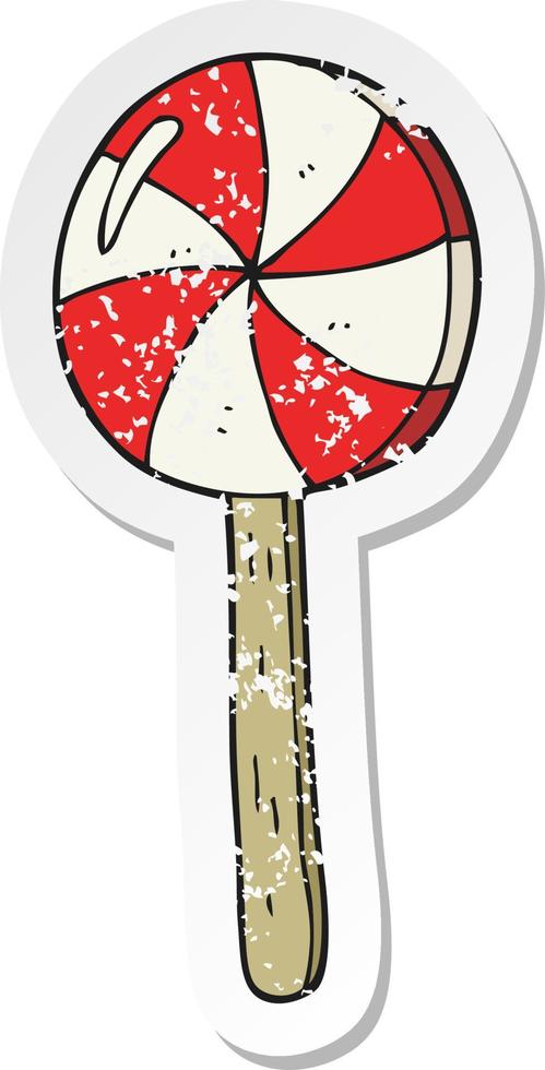 retro distressed sticker of a cartoon lollipop vector