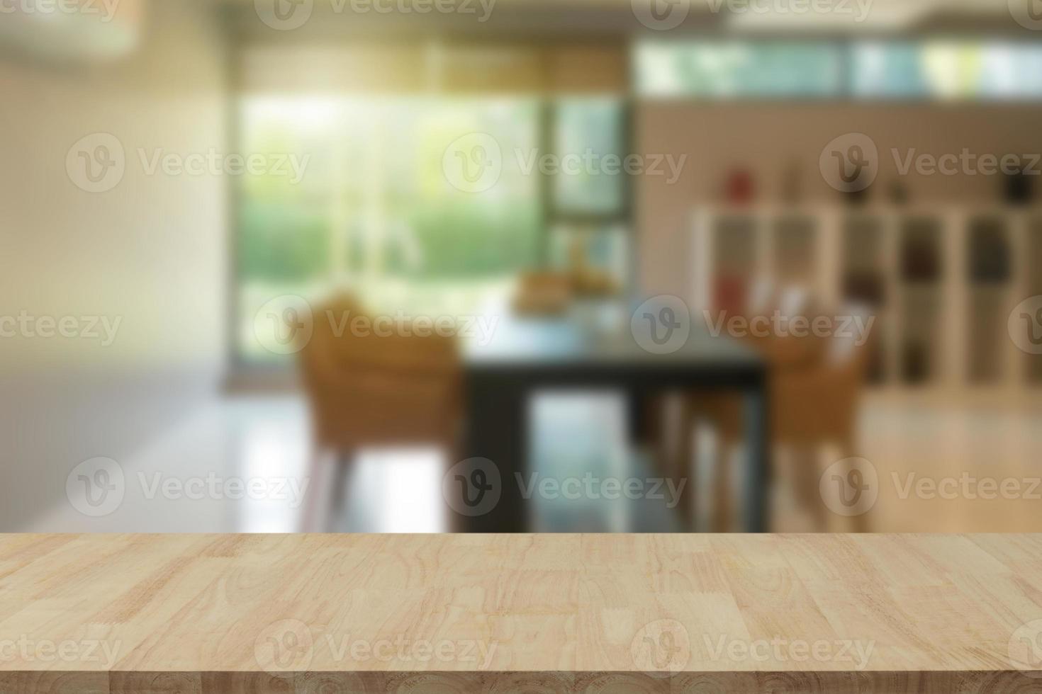 Empty wooden table top with view of office or wooden desk with library room with blur background, copy space for your text photo