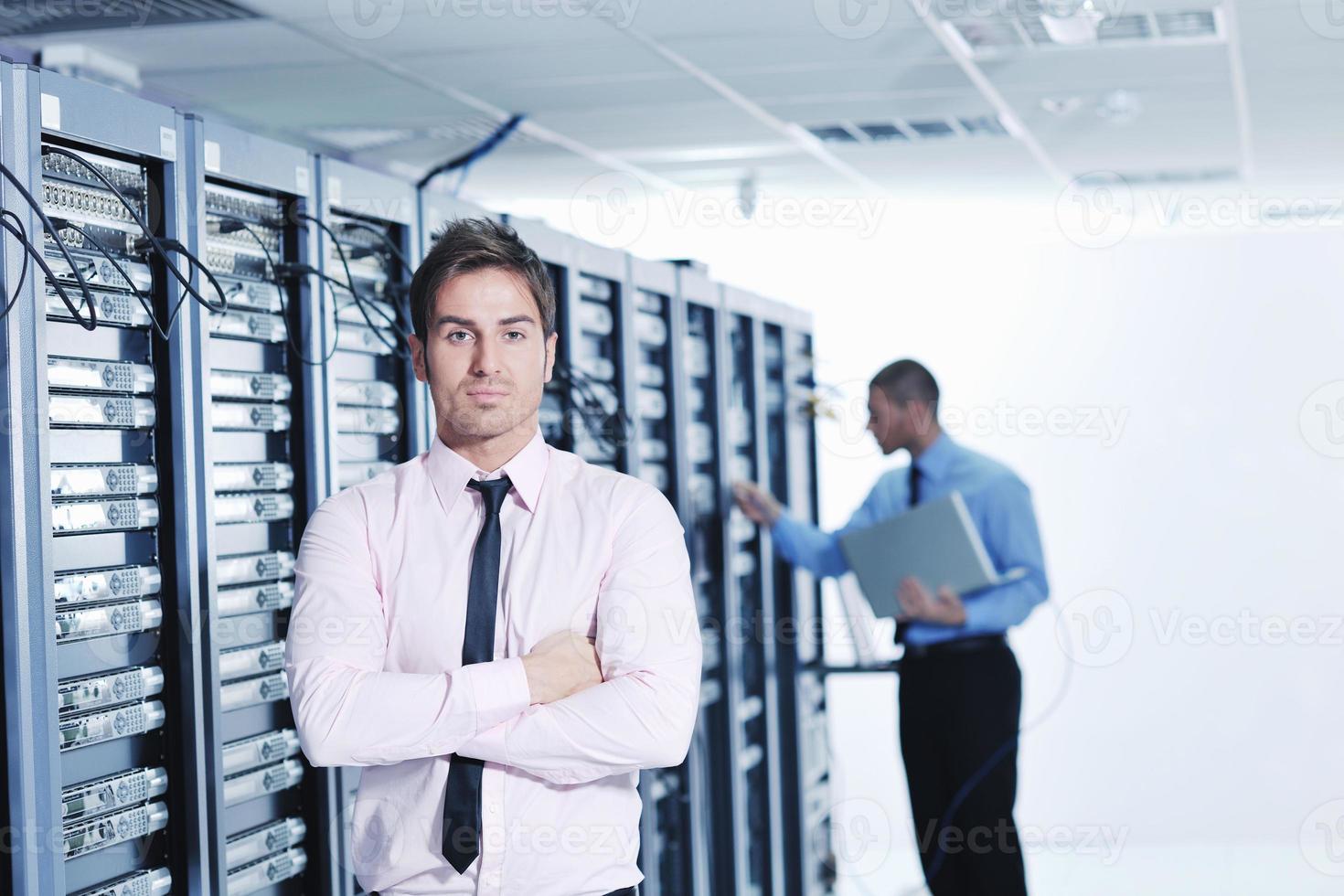 it engineers in network server room photo