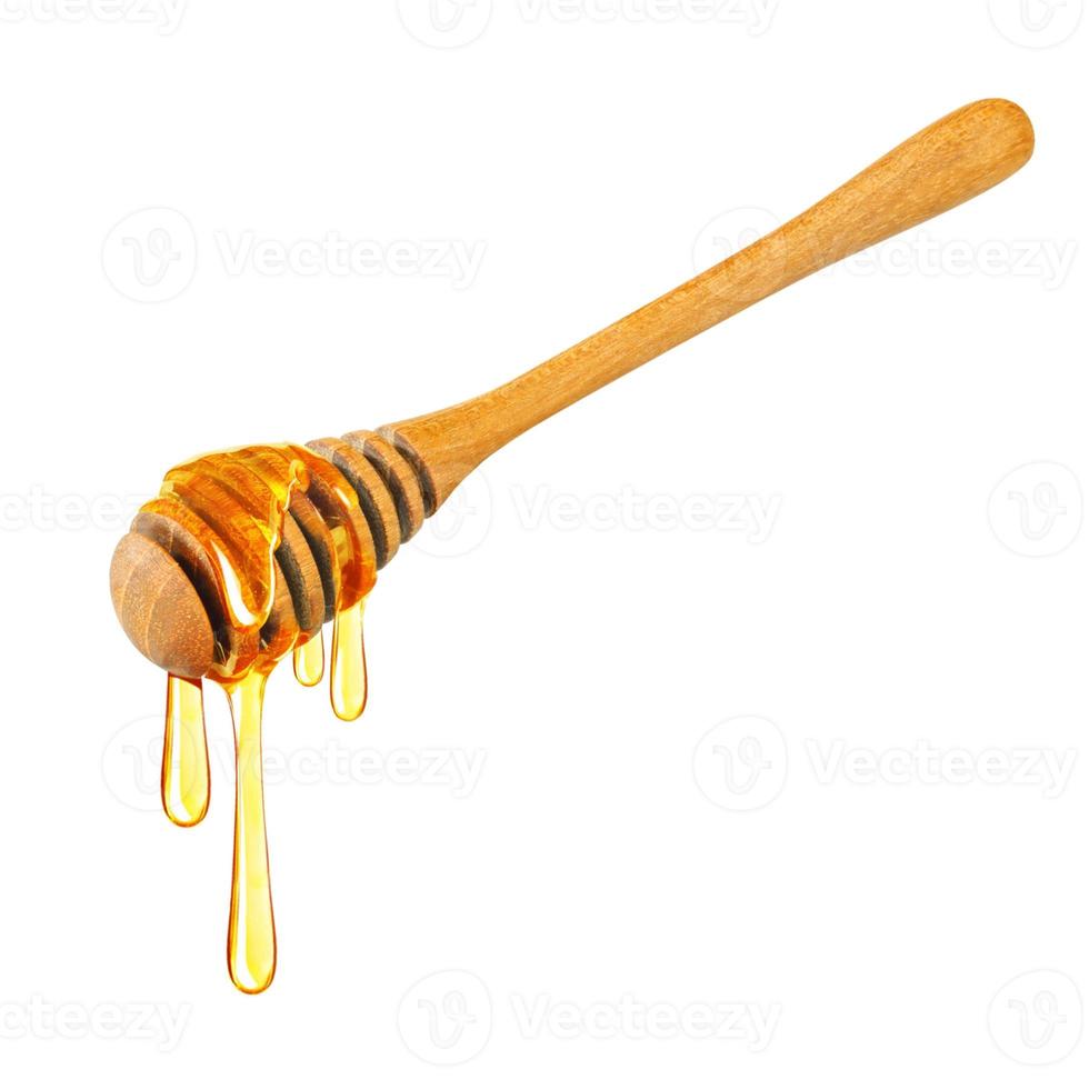 Honey dripping isolated on a white background, Dripped honey, Honey dipper photo