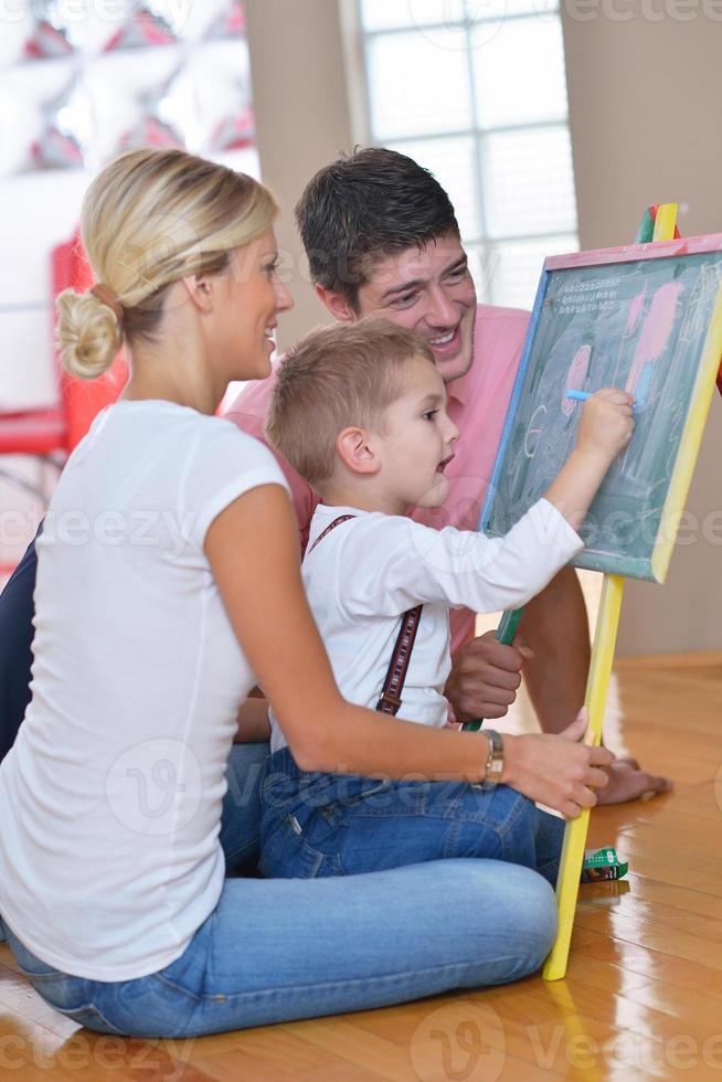 family drawing on school board at home photo