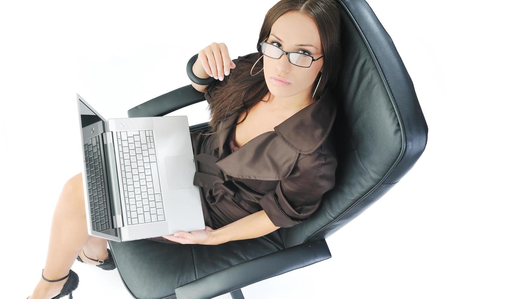 business woman with laptop isolated on white photo