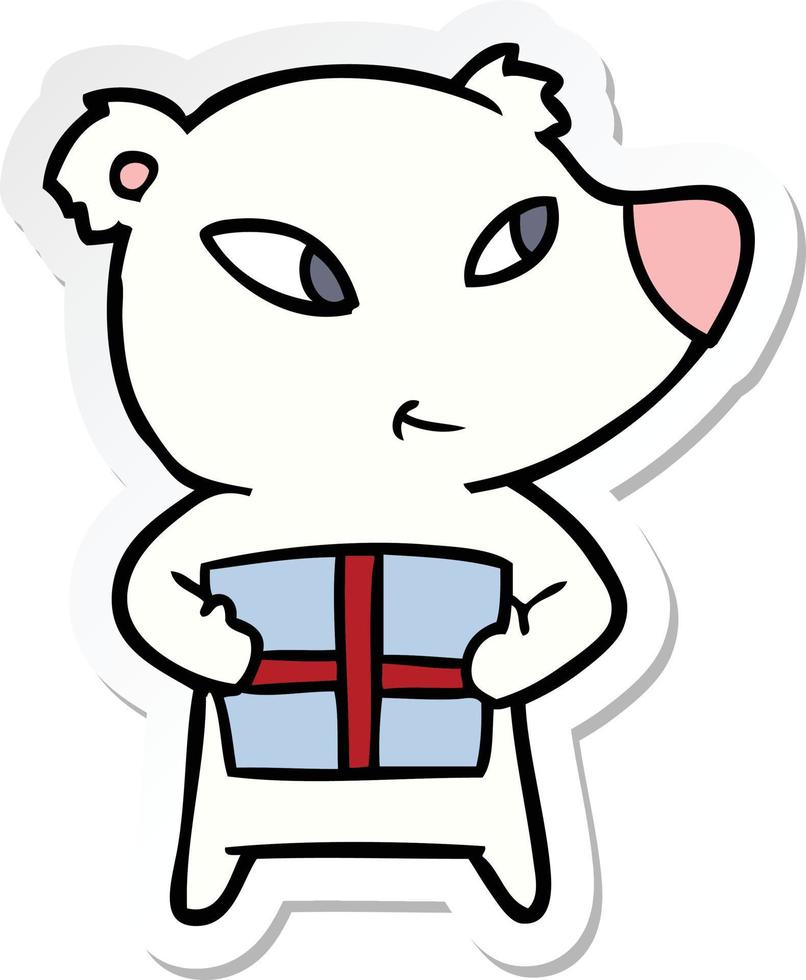 sticker of a cute cartoon polar bear with xmas present vector