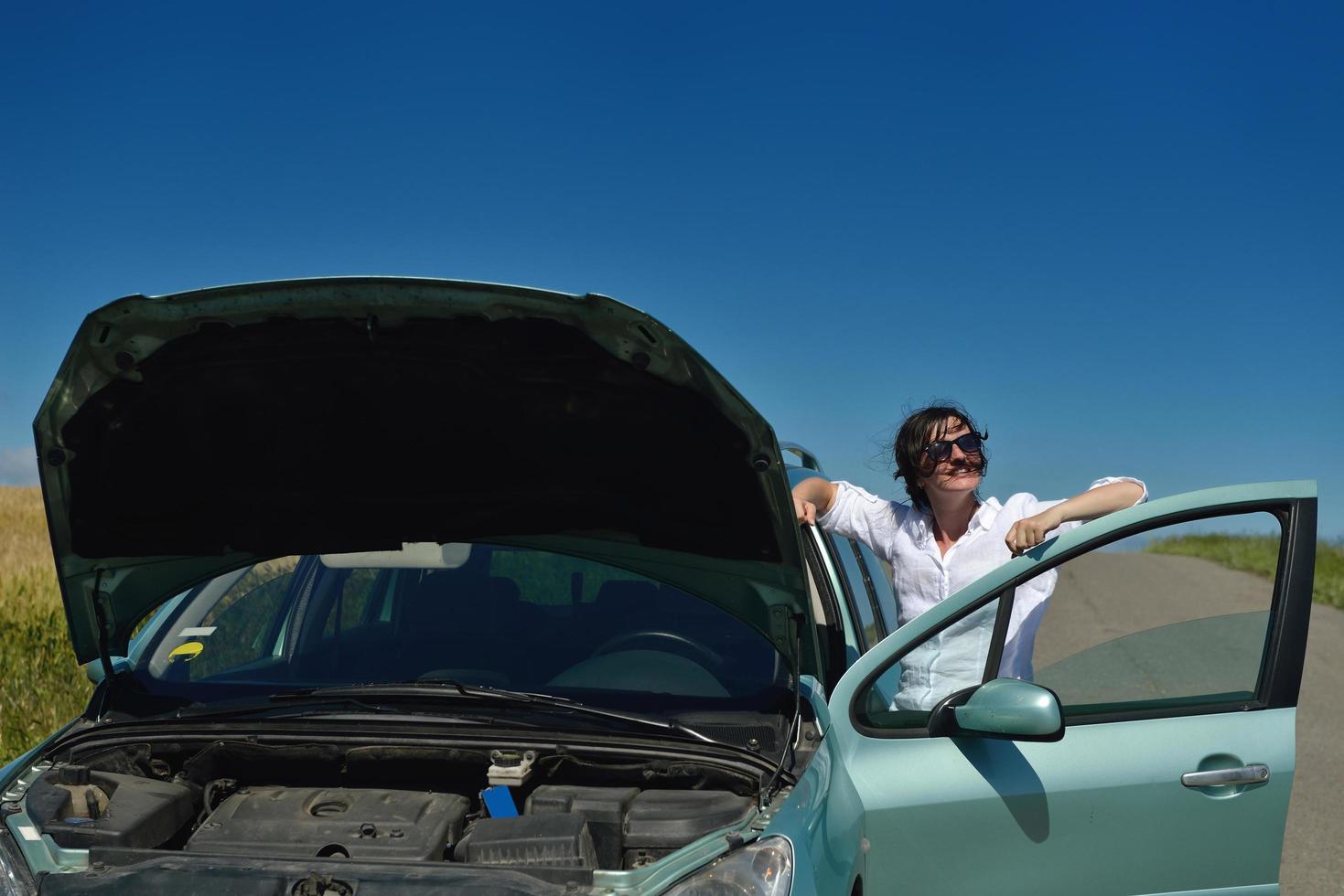 woman with broken car photo