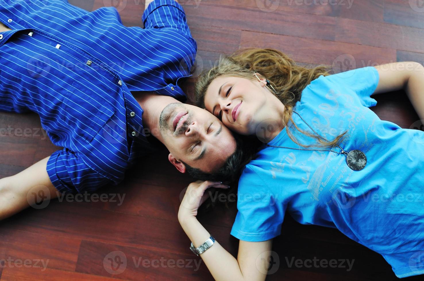 happy couple in empty apartment photo