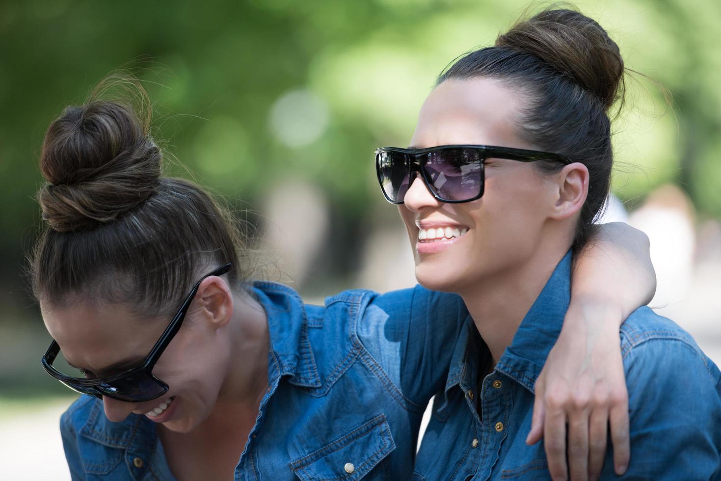 twin sister with sunglasses photo