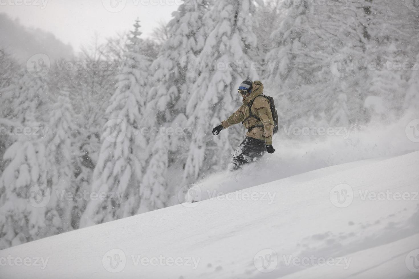 Skier on mountain photo