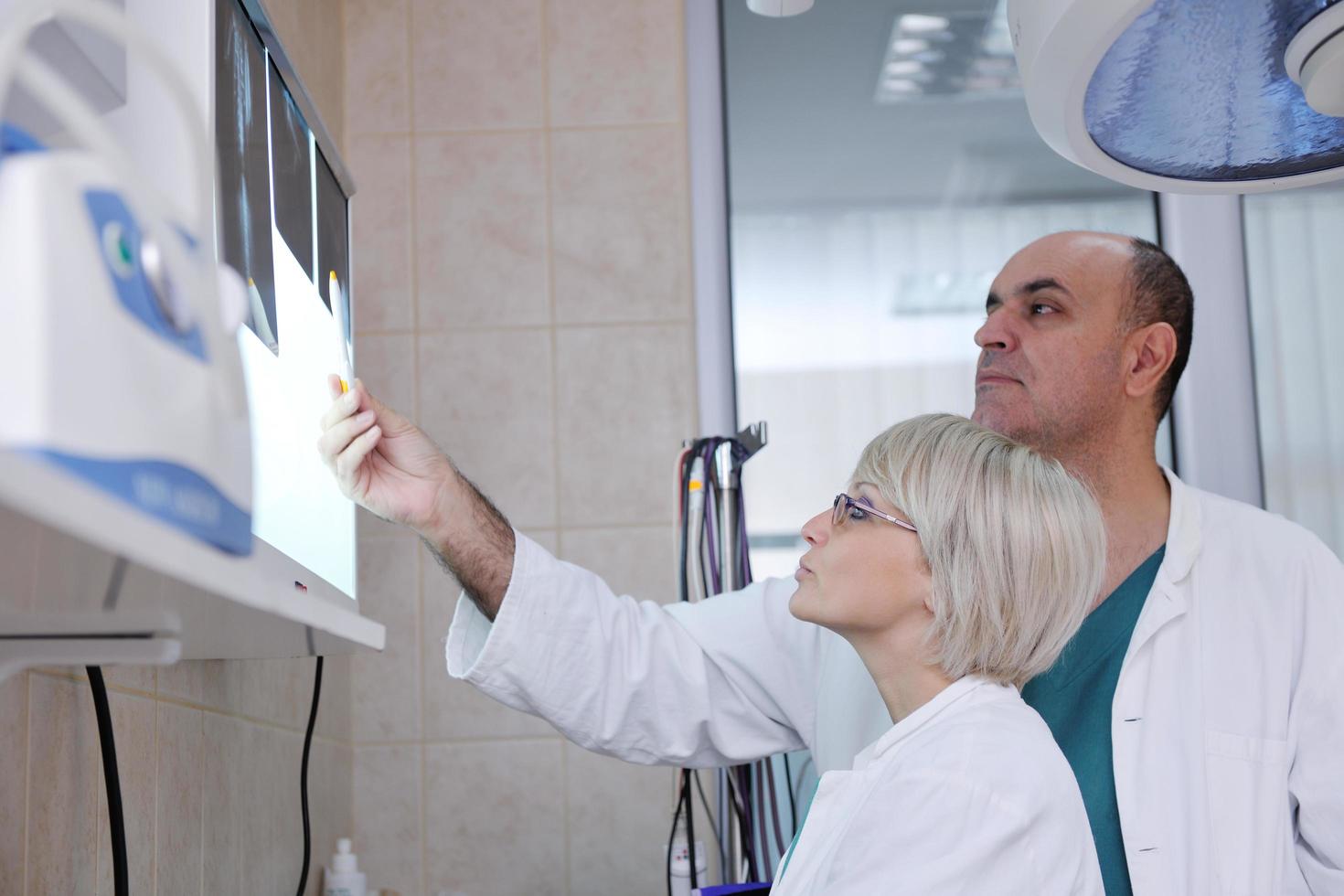 veterinarian and assistant in a small animal clinic photo