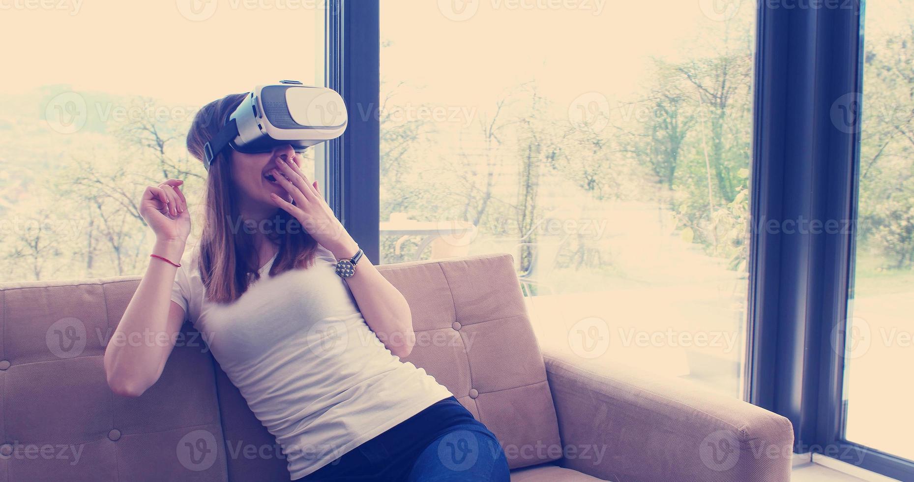 woman using VR-headset glasses of virtual reality photo