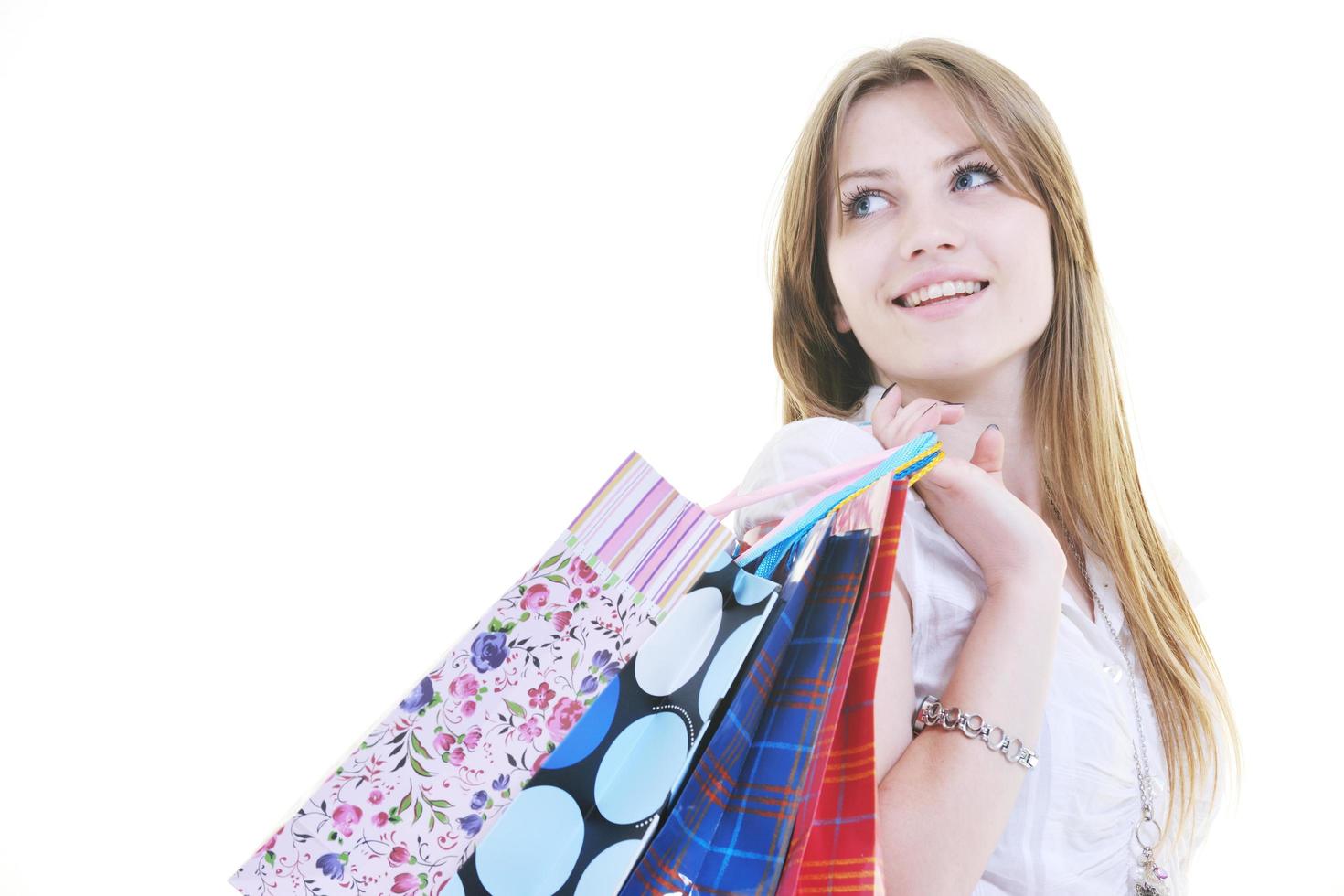 happy young adult women  shopping with colored bags photo