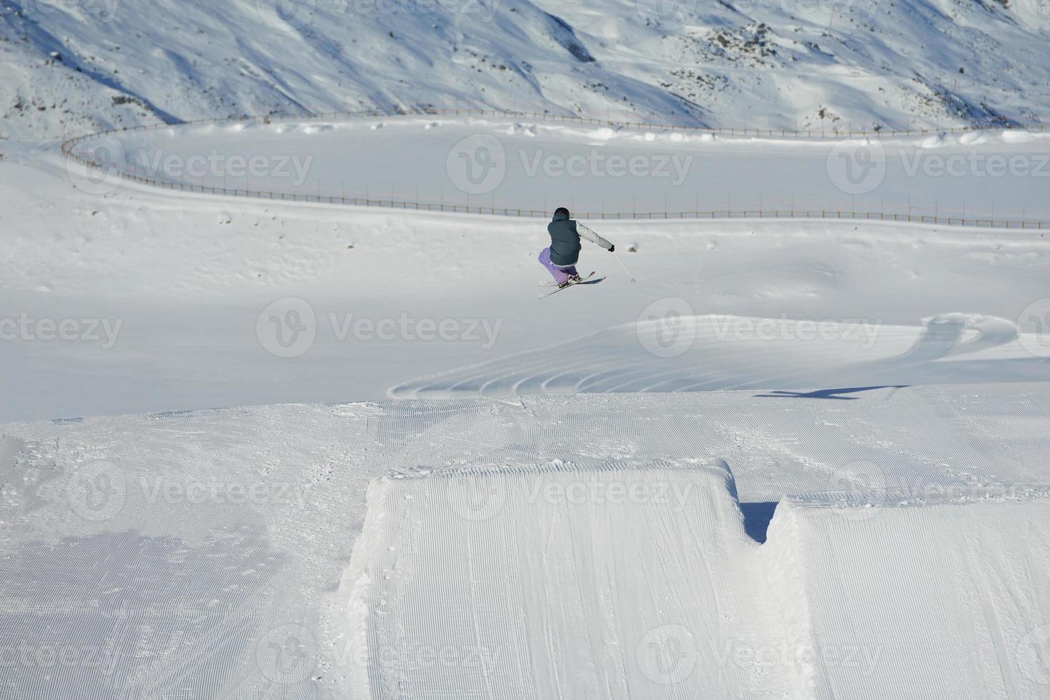 Skiers on mountain photo