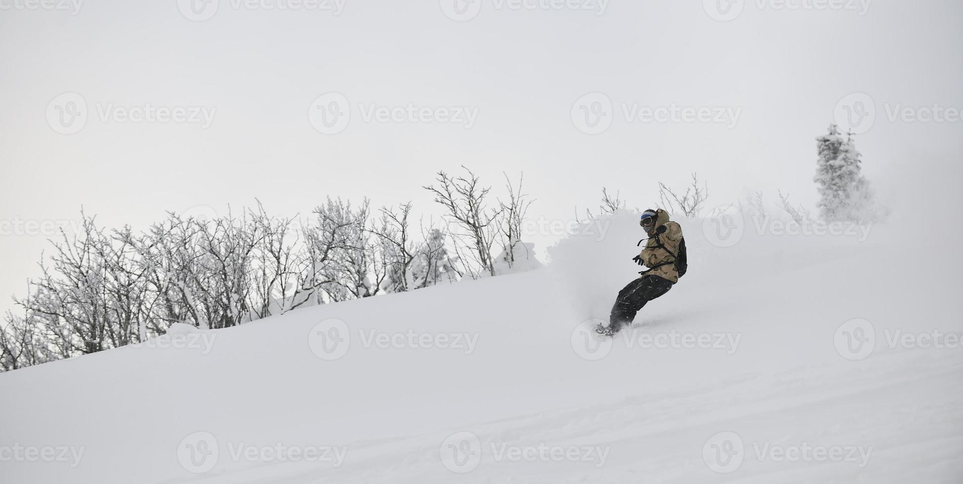 Skier on mountain photo