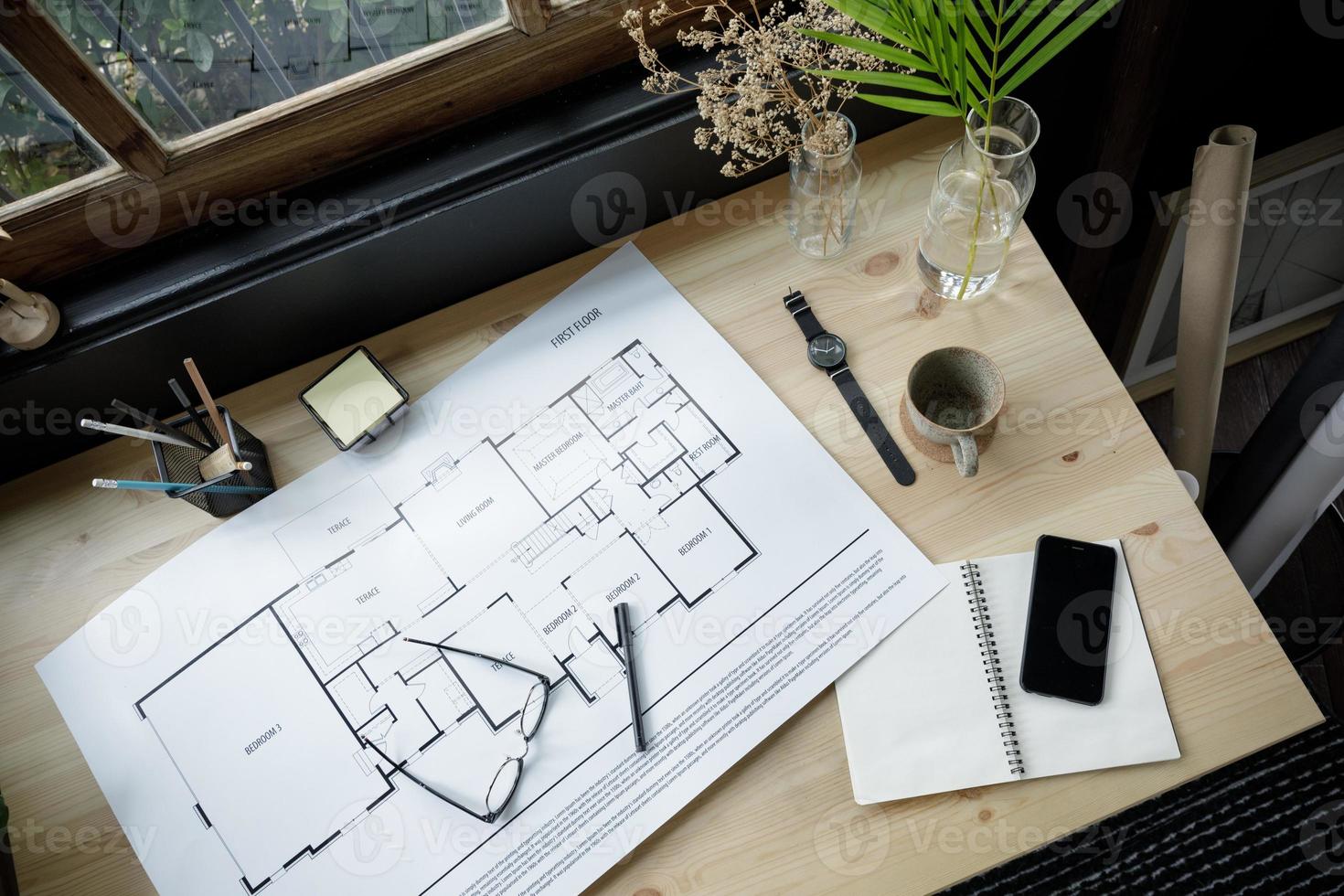 Top view workspace mockup of architectural project with architectural project plan, engineering tools, office supplies and hot coffee cup on wooden desk empty space photo