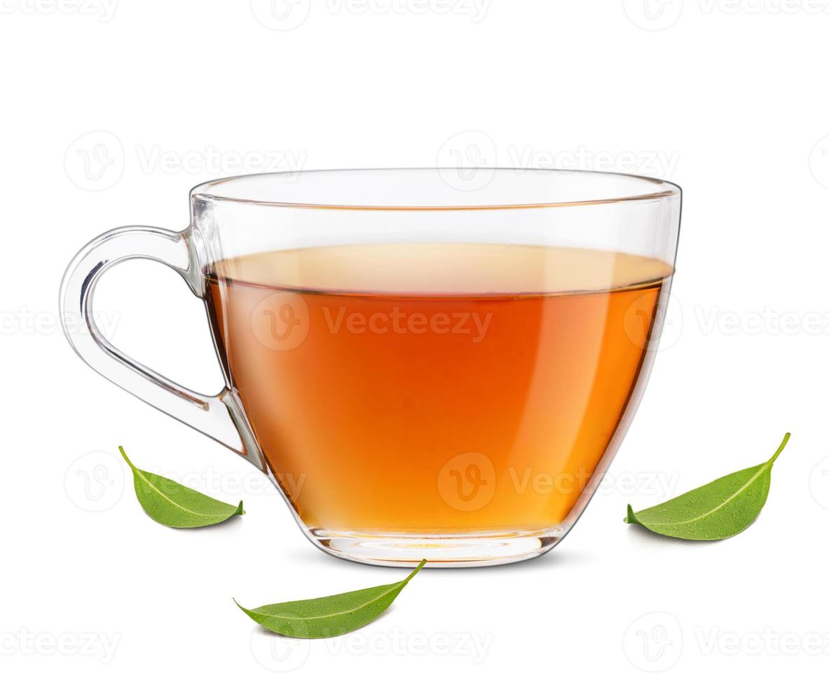 Hot cup of tea with green tea leaves, Healthy products by organic natural ingredients concept, Empty space in studio shot isolated on white background photo