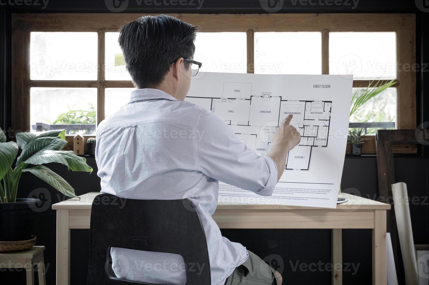 Young businessman architecture freelancer working from home lifestyle in modern home office, Quarantine isolation during the Coronavirus COVID-19 health crisis photo