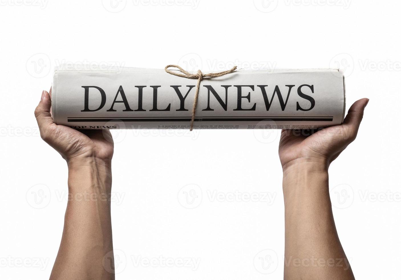 Hands holding the Business Newspaper isolated on white background, Daily Newspaper mock-up concept photo