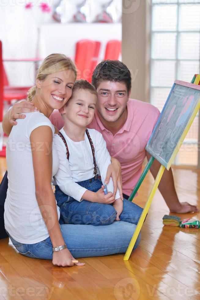 family drawing on school board at home photo