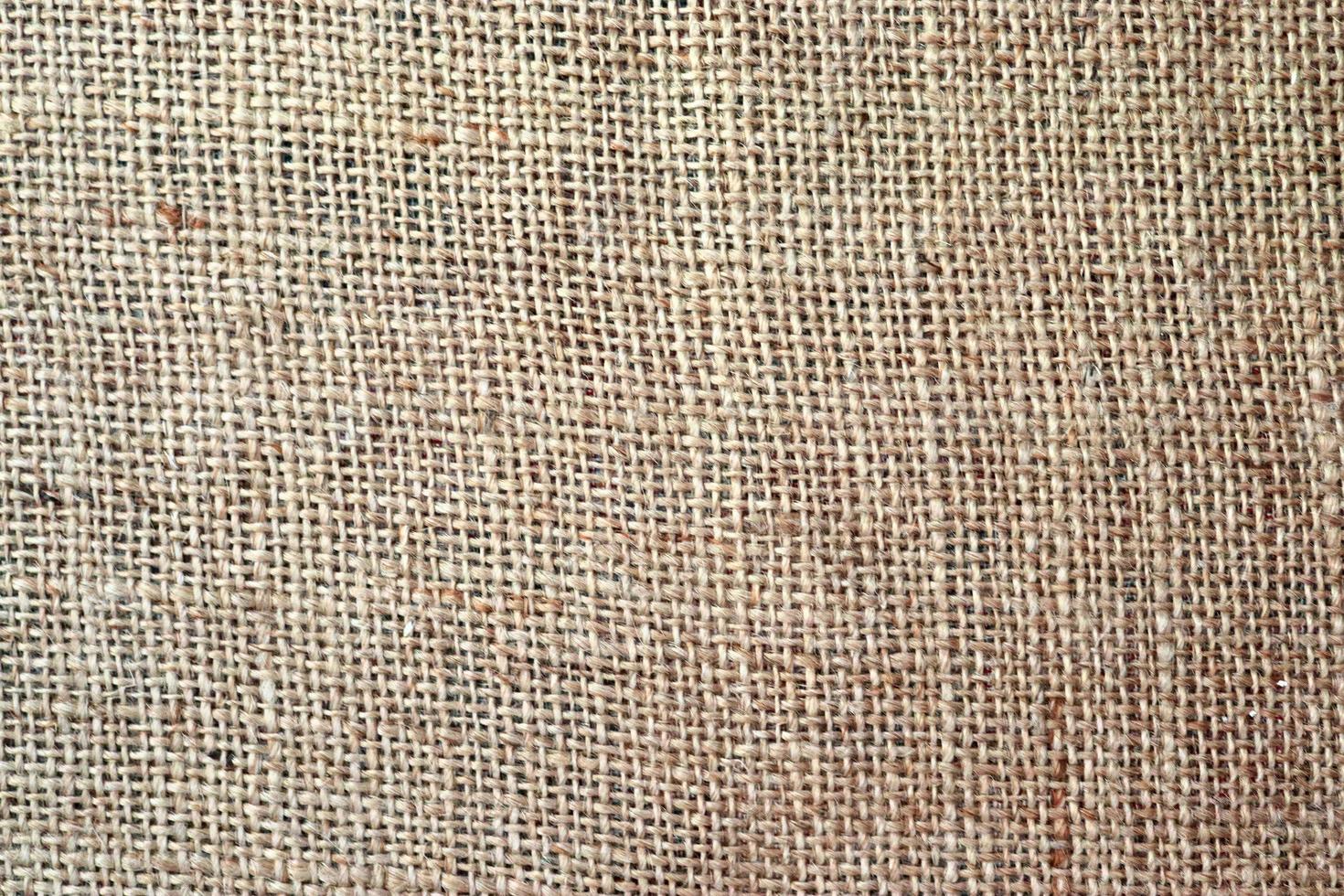 Detailed close up view on samples of cloth and fabrics in different colors found at a fabrics market photo