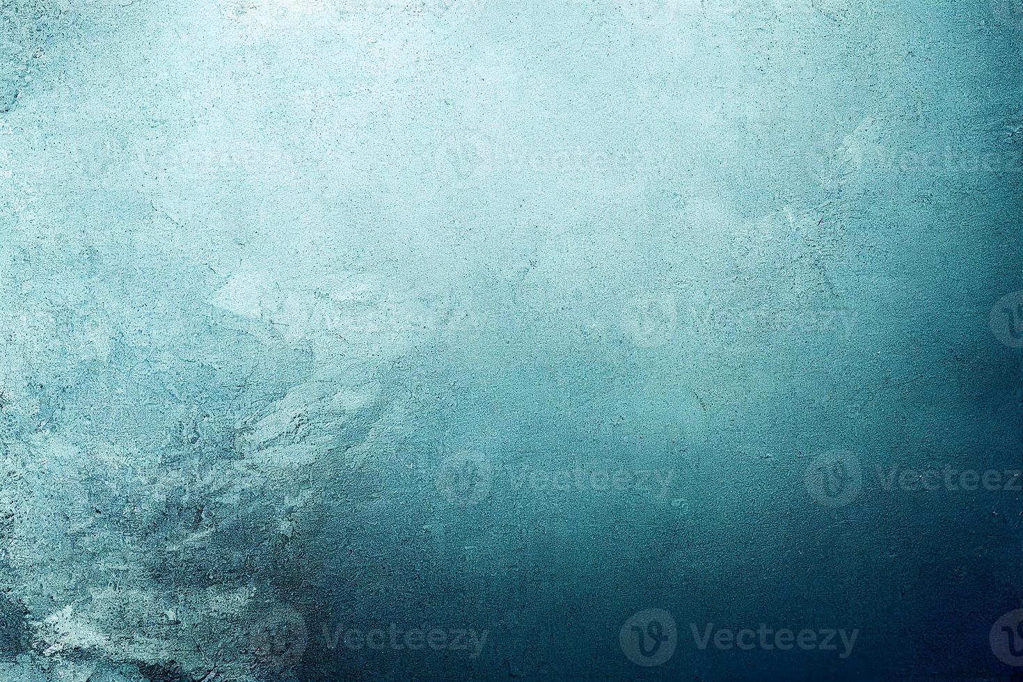 A computer generated illustration of a grunge wall surface texture background in blue, teal, turquoise colour. A.I. generated art. photo