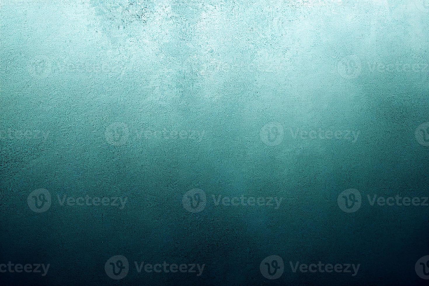 A computer generated illustration of a grunge wall surface texture background in blue, teal, turquoise colour. A.I. generated art. photo