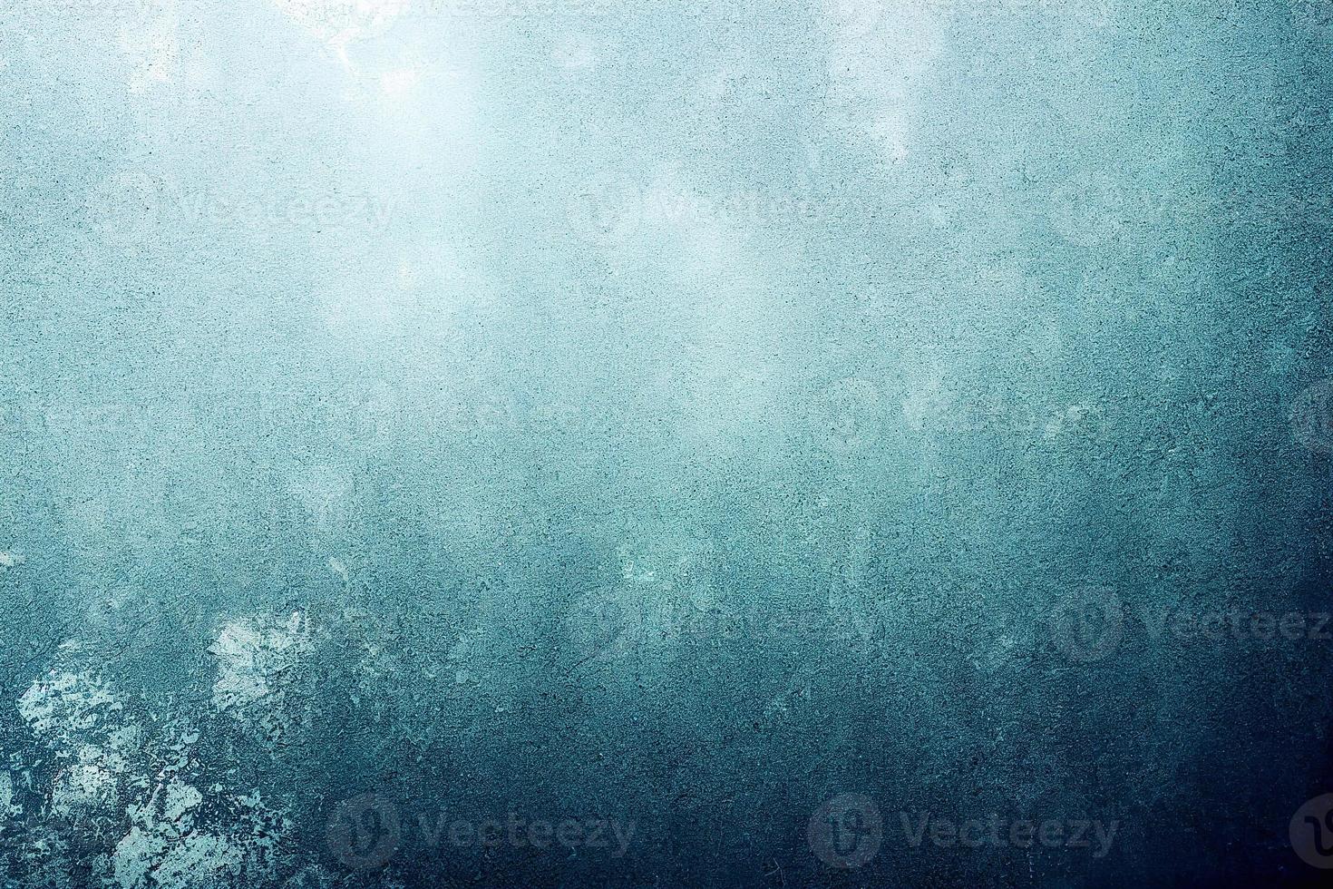 A computer generated illustration of a grunge wall surface texture background in blue, teal, turquoise colour. A.I. generated art. photo