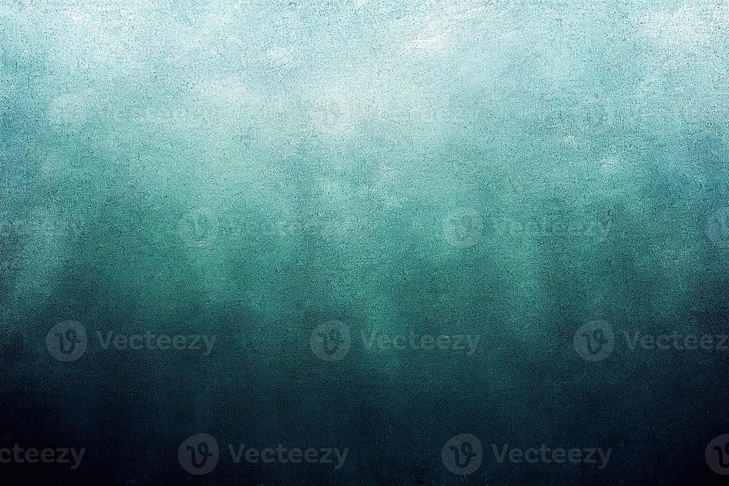 A computer generated illustration of a grunge wall surface texture background in blue, teal, turquoise colour. A.I. generated art. photo