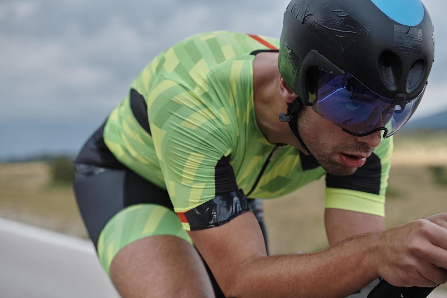 triathlon athlete riding bike photo
