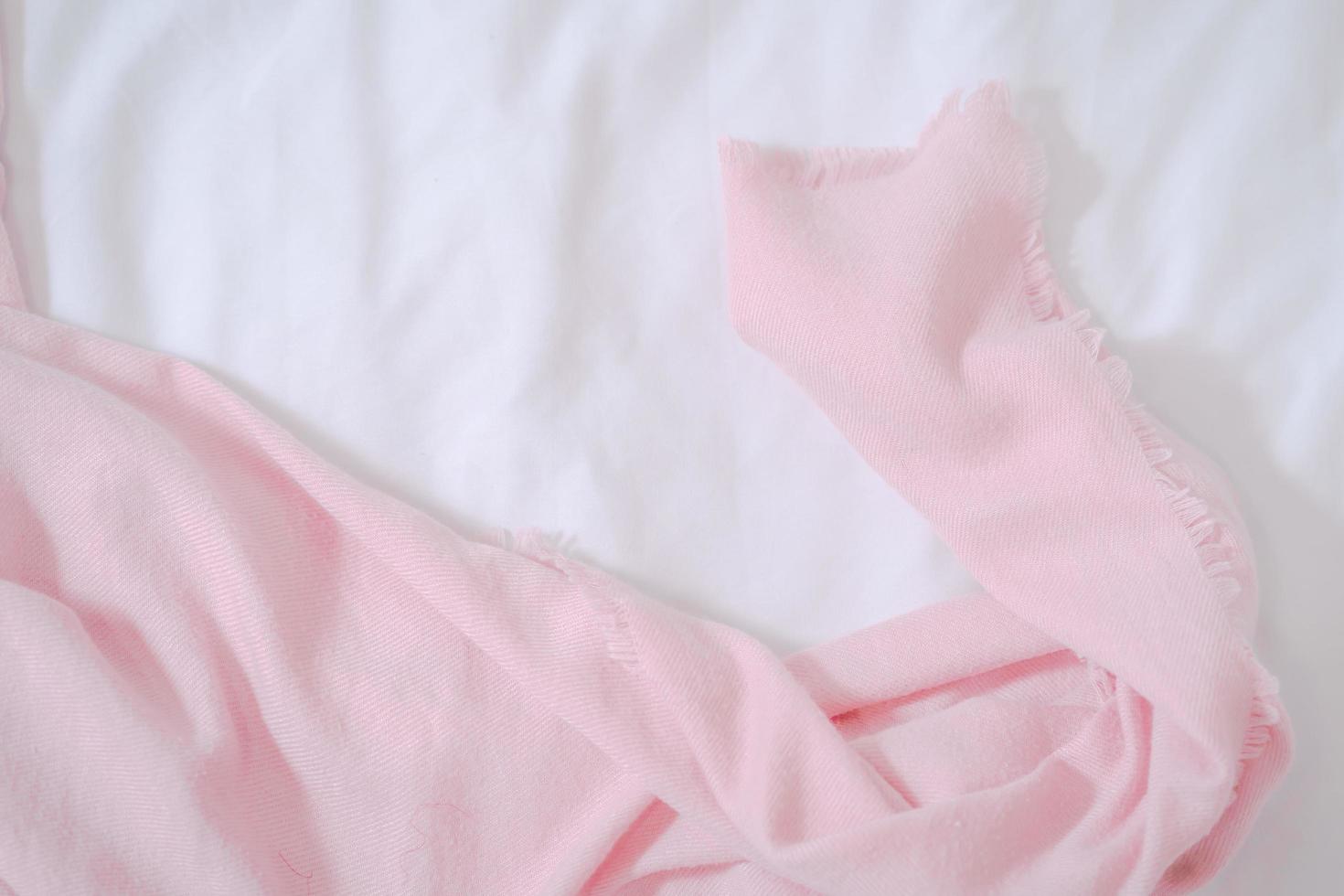 Pink Scarf fabric texture. Winter concept. Flat lay, top view, copy space photo