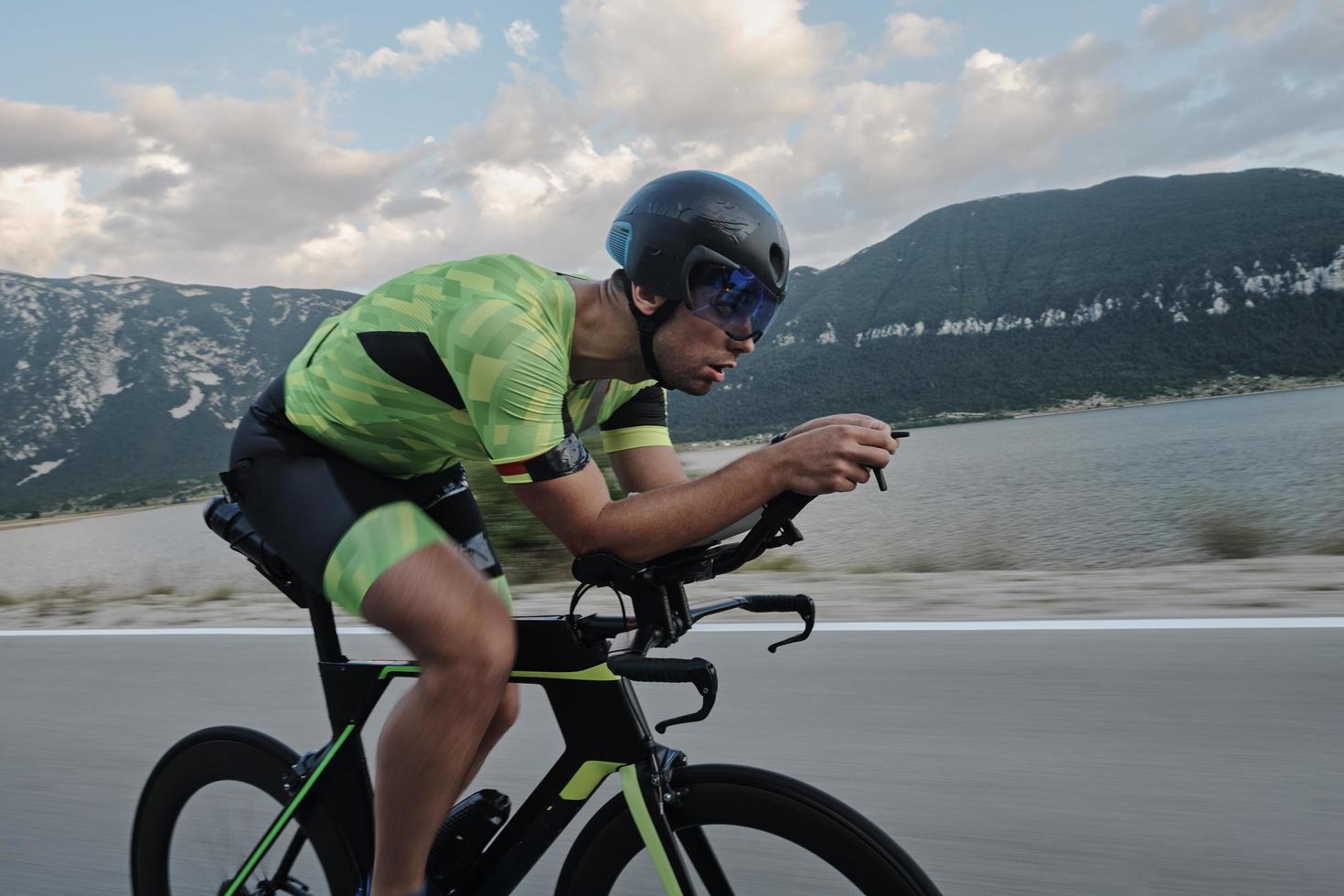 triathlon athlete riding bike photo