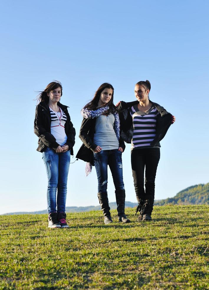 group of teens have fun outdoor photo
