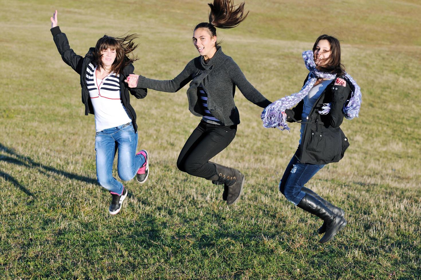 group of teens have fun outdoor photo