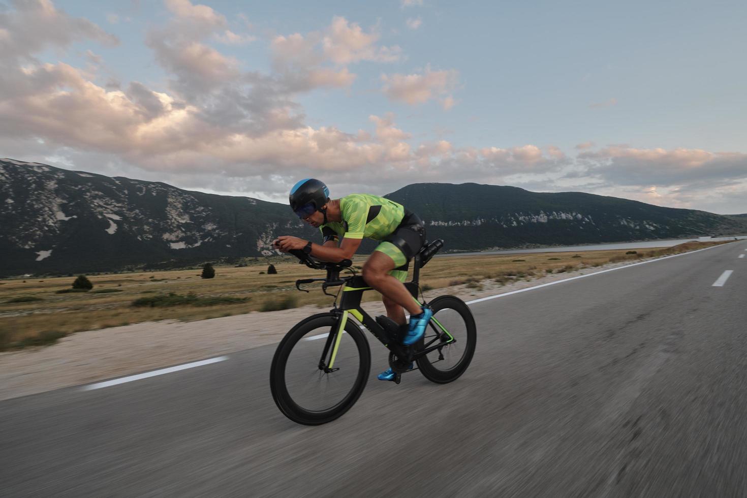 triathlon athlete riding bike photo