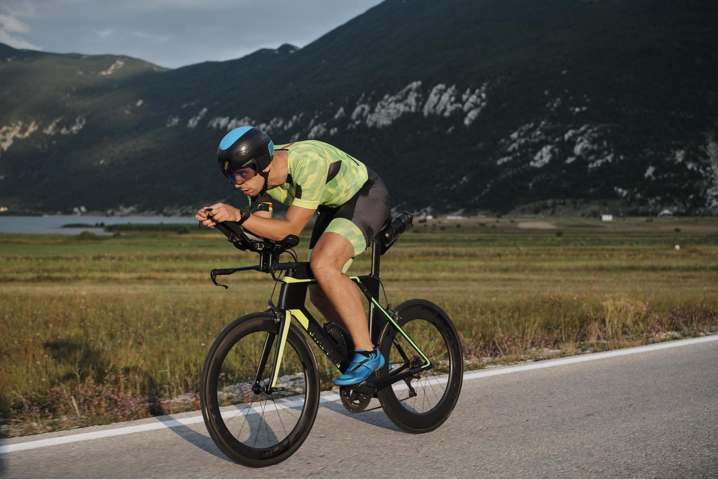 triathlon athlete riding bike photo