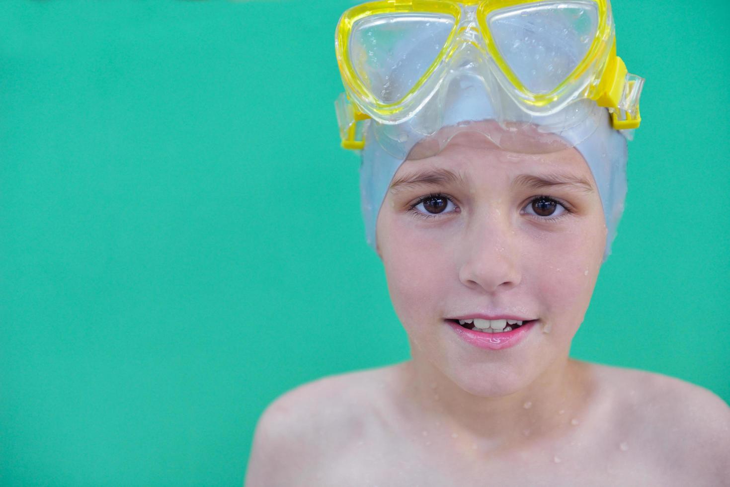 child portrait on swimming pool photo