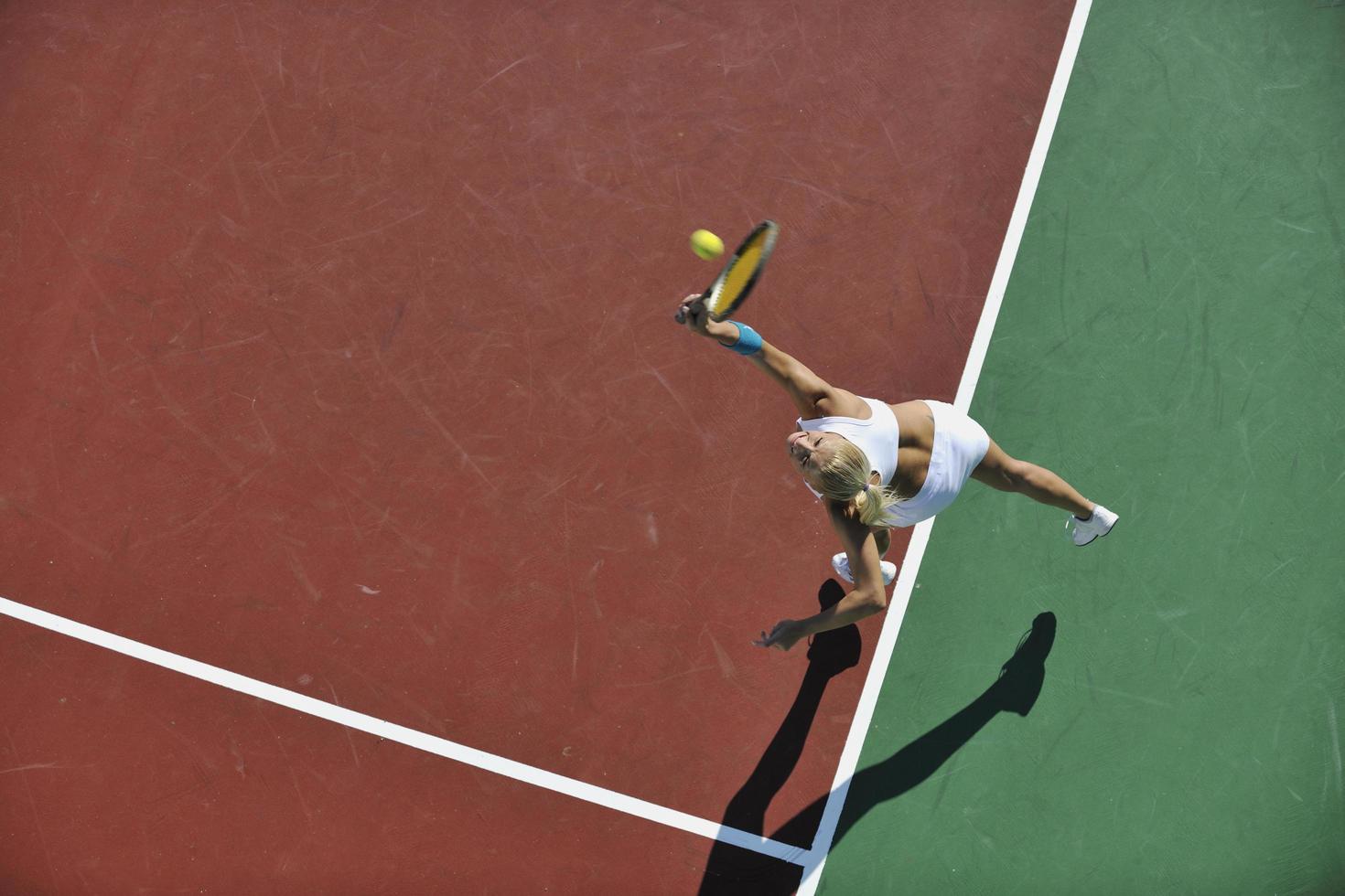 young woman play tennis photo