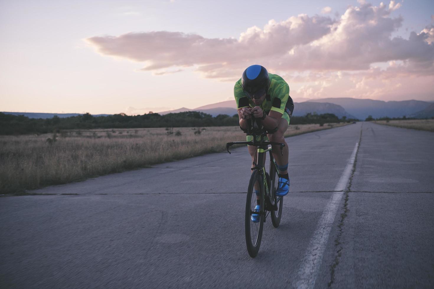 triathlon athlete riding a  bike photo